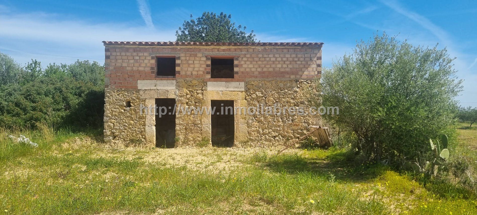 FINCA RUSTICA PEGADO A INCA CON EDIFICACION 
